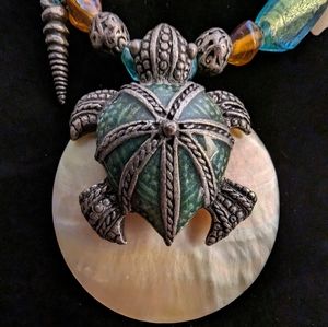 Turtle shell and bead necklace